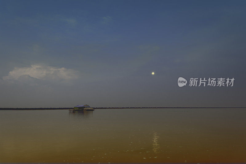 Tonlé Sap with moon in Cambodia